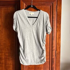 Cute Michael Kors T-shirt. Grey color, ruched sides and zipper sleeves.